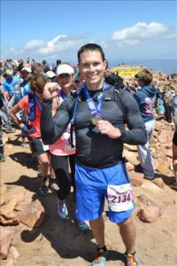 dr. kenney finishing a race